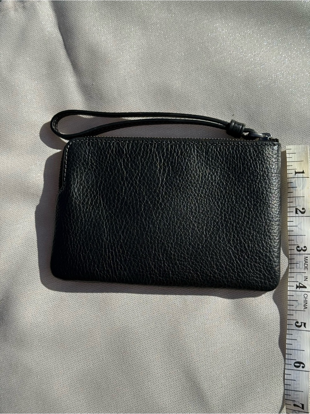 Coach Black Pebbled Leather Star & Heart Stud Wristlet with Metallic Accents - Picture 3 of 5